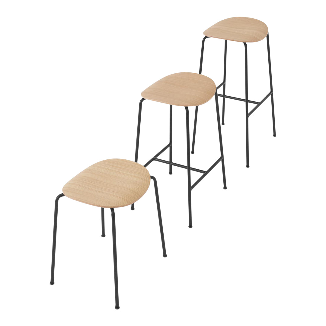 Set of three modern stools featuring natural wood seats and sleek black metal legs, creating a minimalist aesthetic.