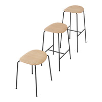 Set of three modern stools featuring natural wood seats and sleek black metal legs, creating a minimalist aesthetic.