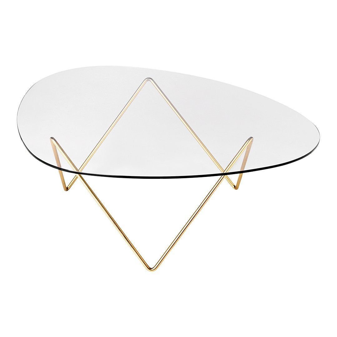 Clear glass coffee table with a geometric gold metal base, featuring an elegant, minimalist design.
