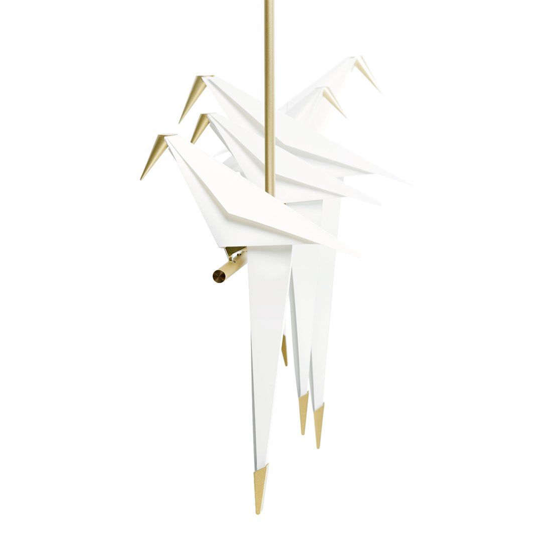 White origami cranes with gold accents, creating a modern and elegant design for stylish decor.