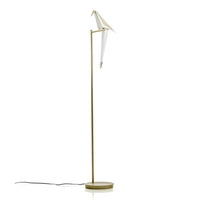 Elegant white lamp with a gold stand, featuring a sleek, modern design and minimalistic silhouette.