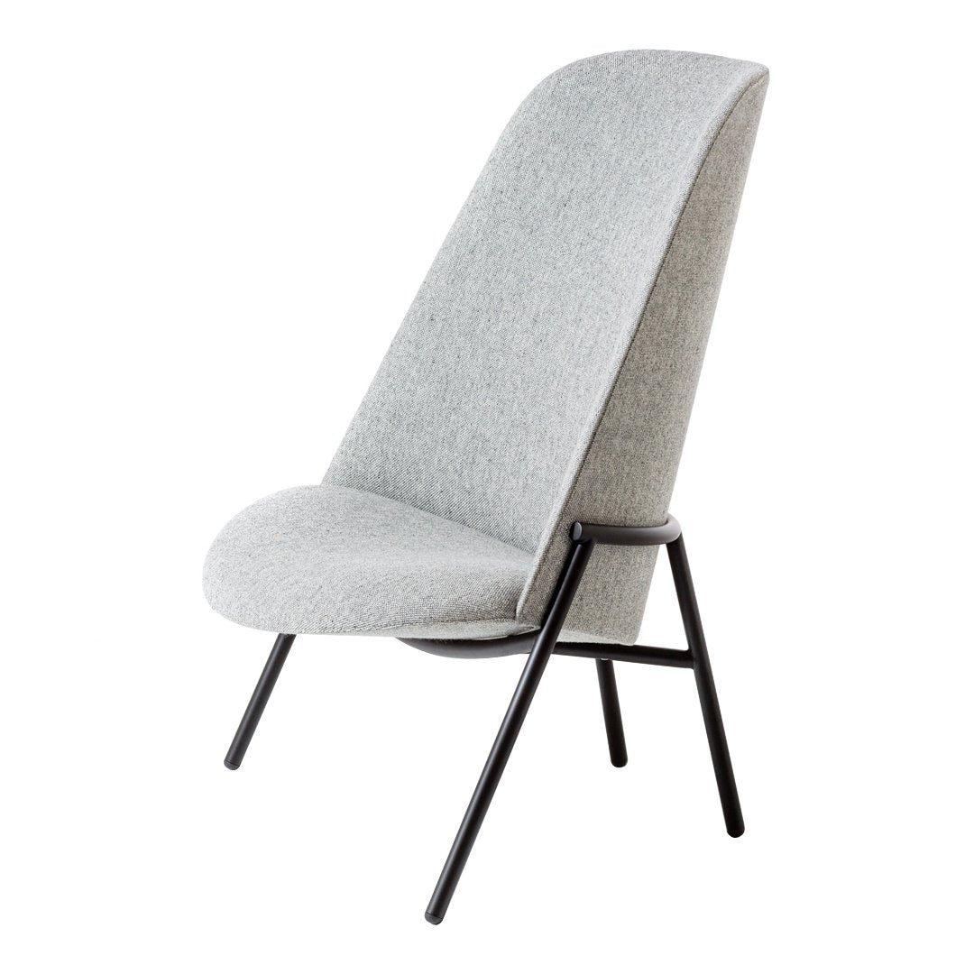 Light gray upholstered chair with a sleek, modern design and black metal legs, perfect for contemporary interiors.