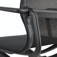 Black ergonomic chair with a sleek mesh back and subtle linear patterns for optimal breathability and comfort.