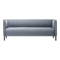 Stylish gray sofa with clean lines and minimalist design, featuring solid fabric and black metal legs.