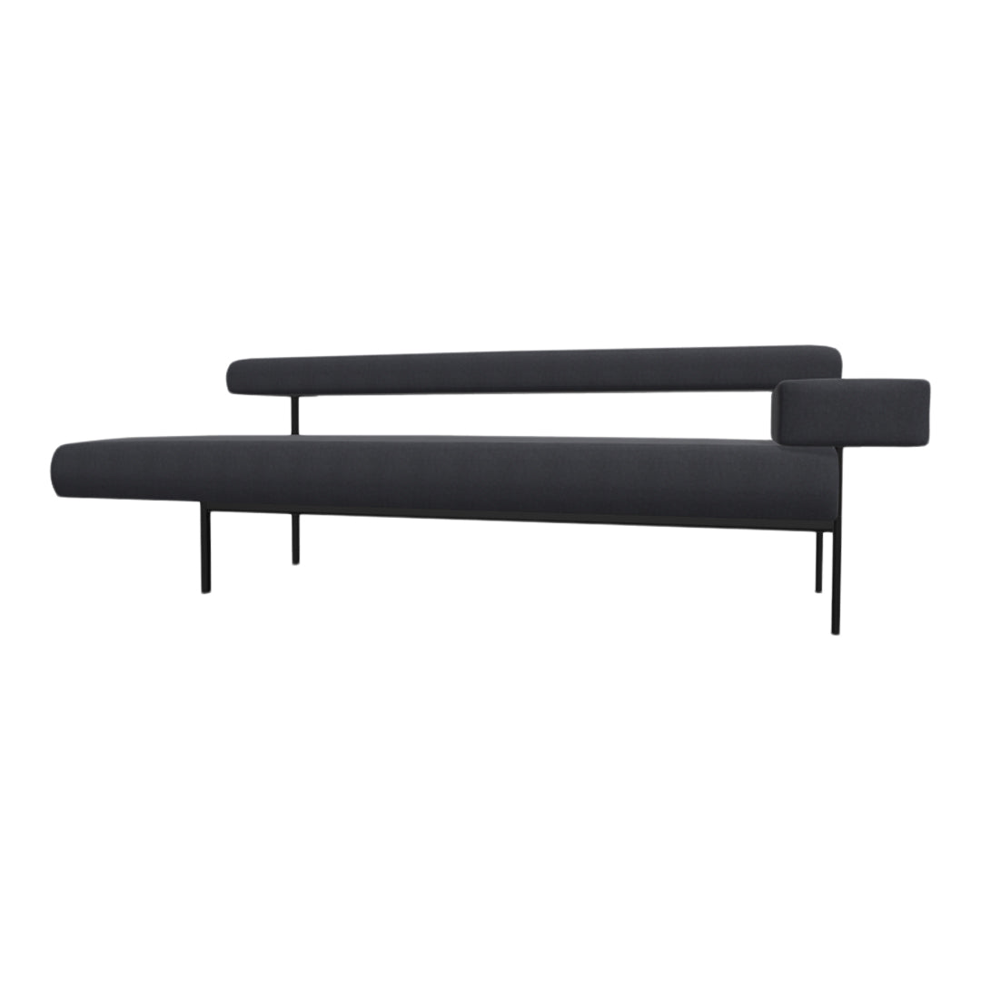 Sleek modern couch in deep charcoal gray fabric with minimalist black metal legs and accents. No visible patterns.