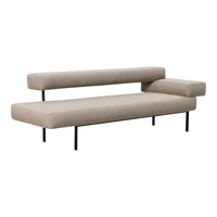 Minimalist beige sofa with sleek black metal legs, featuring a simple, modern design.