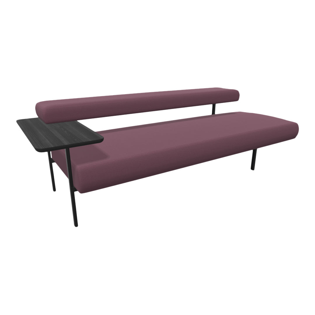 Modern burgundy sofa with sleek black side table, showcasing a minimalist design and clean lines.