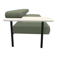 Stylish green upholstered sofa with a textured pattern and a sleek white tabletop supported by black legs.