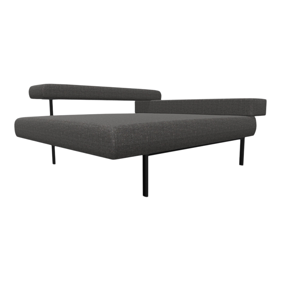 Modern gray lounge chair with a textured fabric and sleek black metal legs. Perfect for contemporary decor.