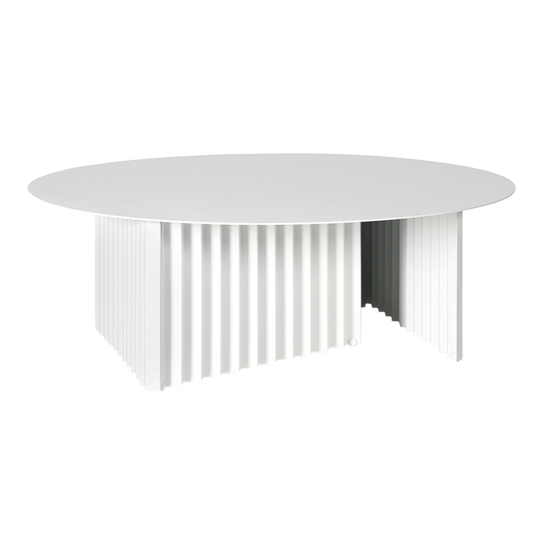 White round table with a textured ribbed base, featuring a sleek and modern minimalist design.