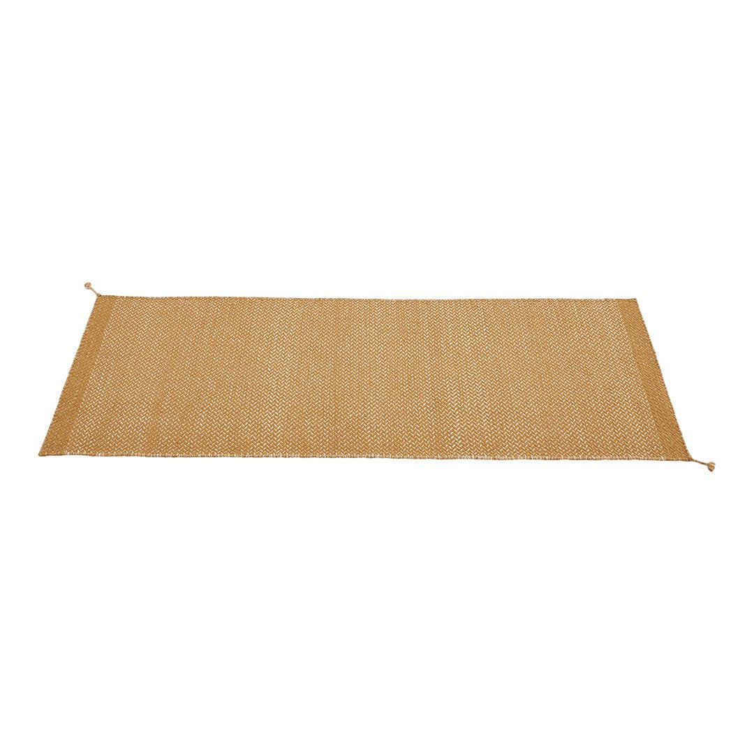Natural beige rectangular rug with a subtle woven texture, perfect for adding warmth to any space.