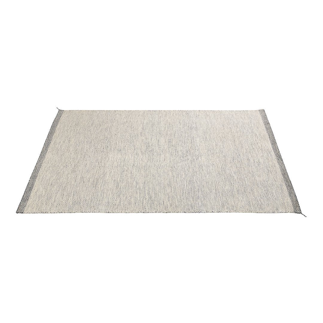 Light grey area rug with subtle texture, featuring a simple, understated design perfect for any decor.