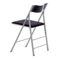 Black folding chair with a sleek silver frame, featuring a smooth matte finish and minimalist design.