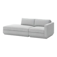 Light gray sectional sofa with a modern minimalist design and smooth fabric texture, perfect for contemporary spaces.