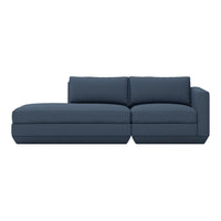 Navy blue sectional sofa with a modern, minimalist design and plush cushions for comfort.