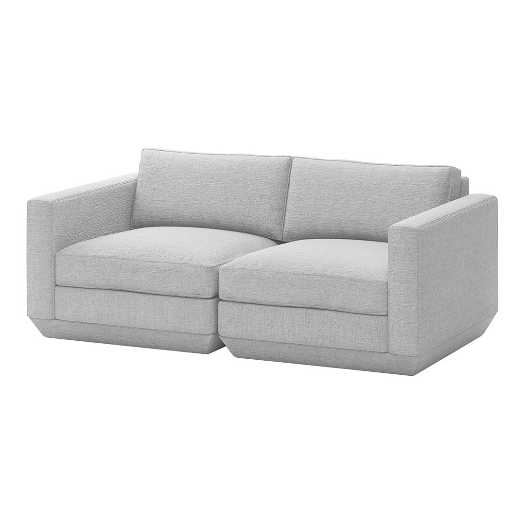 Light gray two-seater couch with a clean, modern design and solid pattern, perfect for contemporary living spaces.