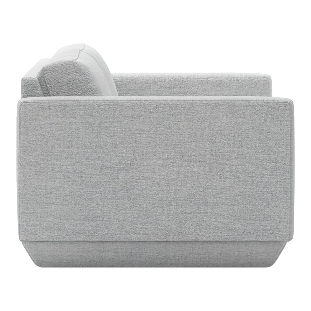 Light gray upholstered sofa with a textured pattern, featuring clean lines and a modern design.