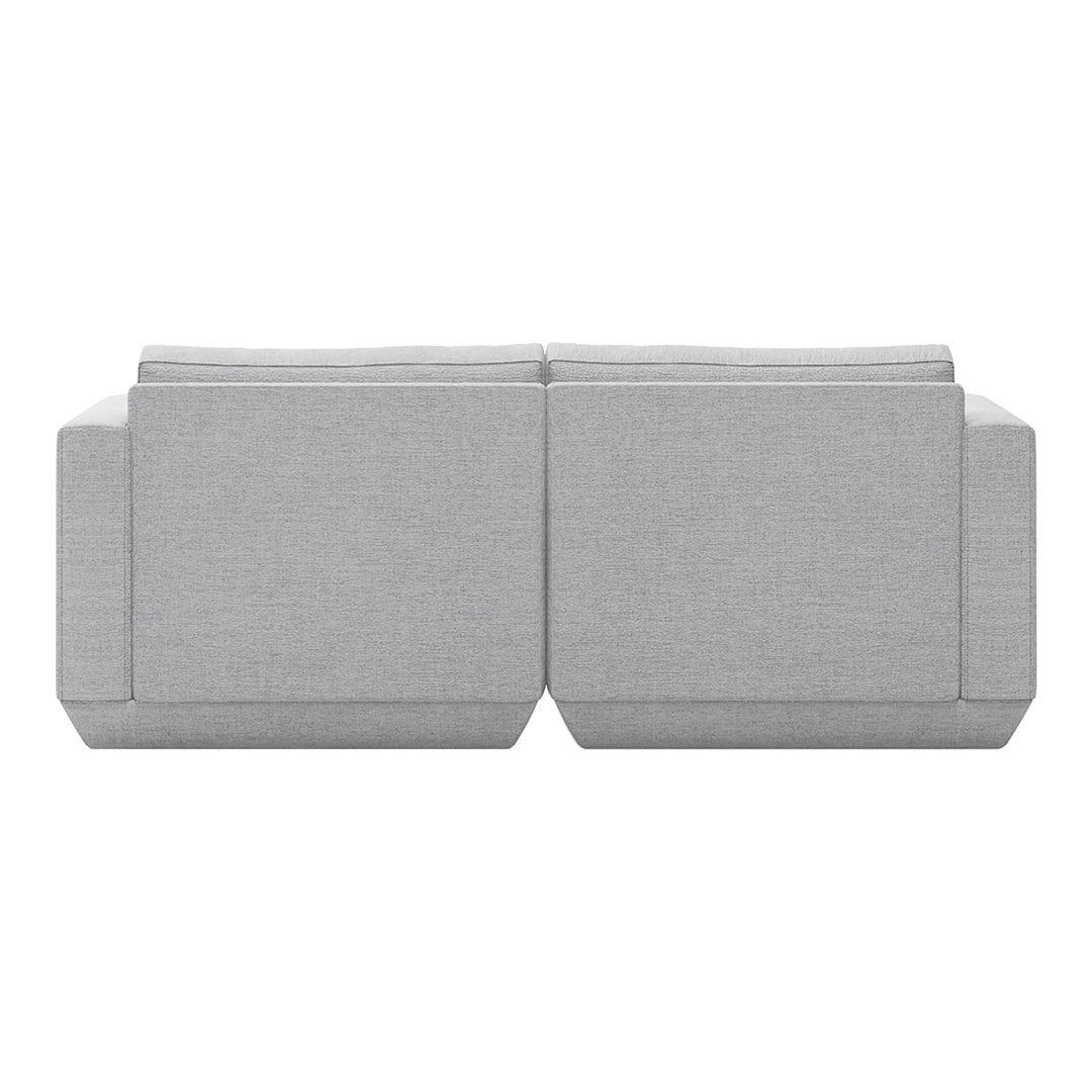 Gray fabric sofa with a minimalist design and smooth, modern lines. Perfect for contemporary living spaces.