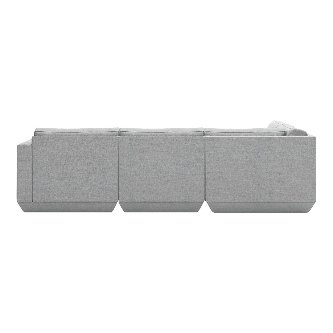Modern gray sofa with a sleek, minimalist design and textured fabric. Perfect for contemporary interiors.