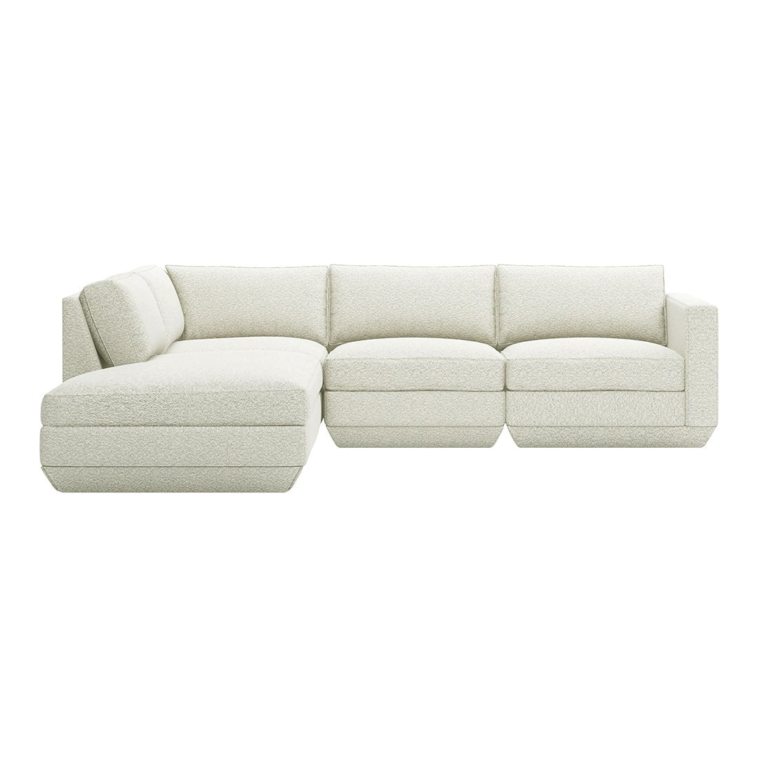 Soft white upholstered sectional sofa with smooth, seamless design and plush cushions for cozy seating.