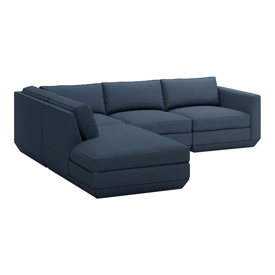 Dark navy blue sectional sofa with smooth upholstery and clean lines, featuring a minimalist design.