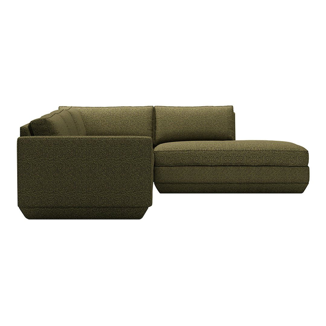 Olive green sectional sofa with a textured fabric pattern, featuring a modern design and plush cushions.