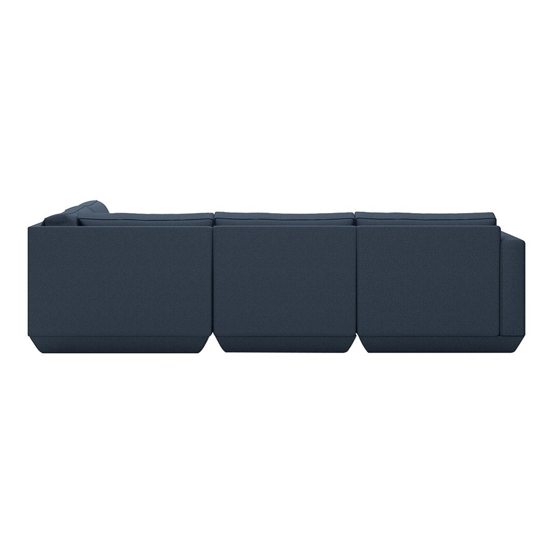 Stylish modular sofa in deep navy blue with a sleek, geometric pattern and minimalist design.