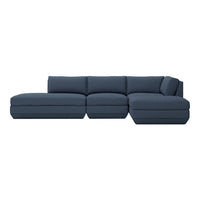 Deep navy blue sectional sofa with smooth, modern lines and minimalist design. Perfect for contemporary living spaces.
