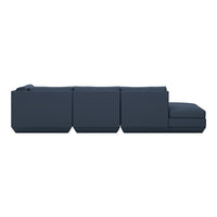 Modern dark blue modular sofa with minimalist design and clean lines, perfect for contemporary living spaces.