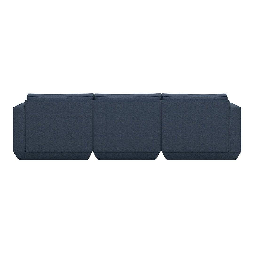 "Deep navy blue modular sofa with a sleek, minimalistic design and clean lines."