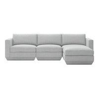 Light gray sectional sofa with a textured fabric and clean, modern lines, perfect for contemporary living spaces.