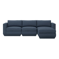 Navy blue sectional sofa with a solid fabric pattern, featuring plush cushions and a modern design.