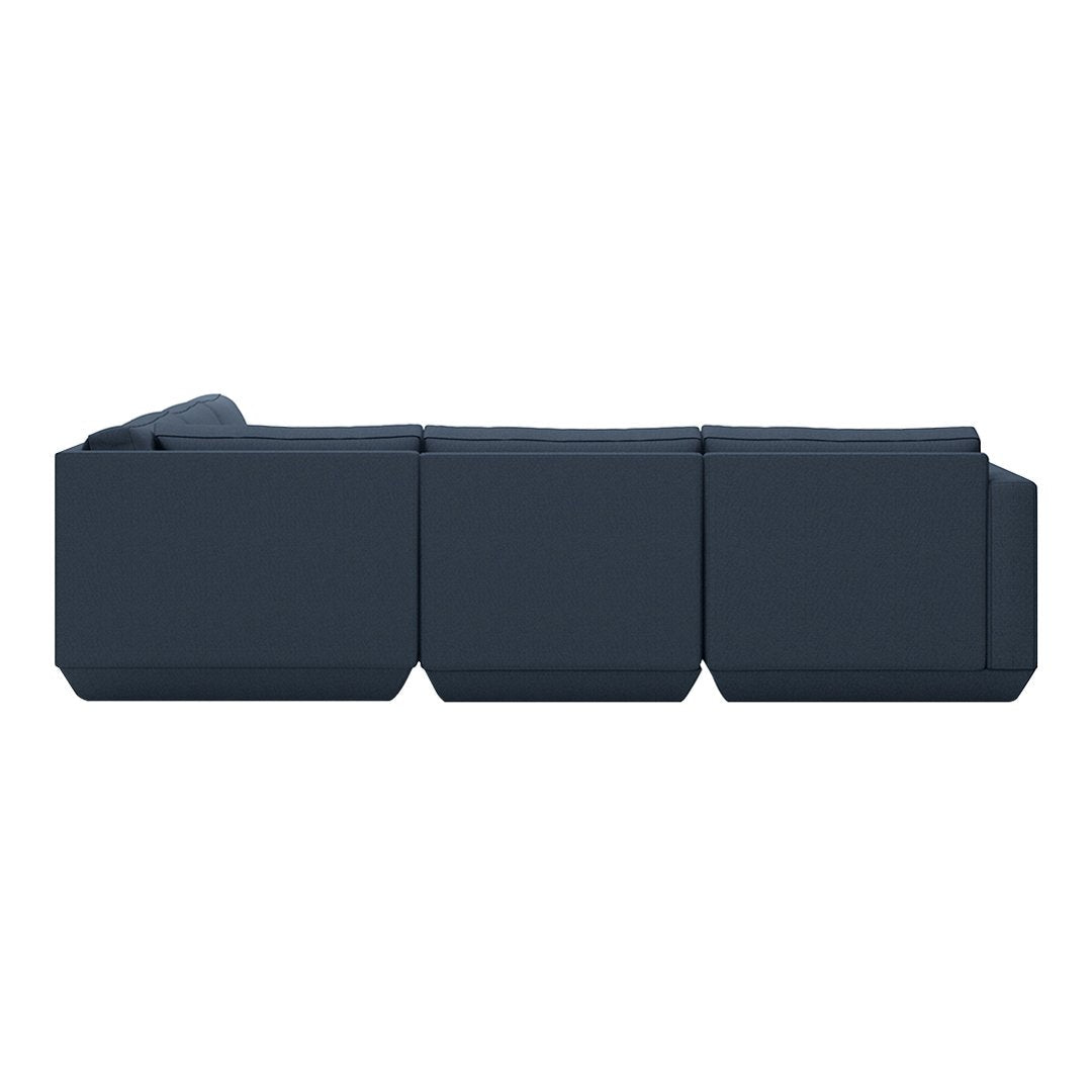 Modern dark blue sectional sofa with clean lines and a minimalist design, perfect for contemporary living spaces.