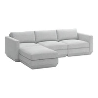 Light gray sectional sofa with a sleek fabric finish, featuring clean lines and a modern minimalist design.