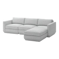 Light gray sectional sofa with a clean, modern design and soft fabric upholstery, featuring minimalistic lines and no patterns.