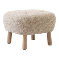Beige tufted pouf with soft, textured fabric and natural wood legs, perfect for adding warmth to any space.