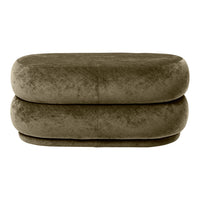 Olive green plush oval ottoman with a smooth, velvety texture and minimalistic design. Perfect for modern decor.