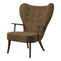 Brown upholstered armchair with button-tufted back, featuring wooden armrests and tapered legs. Elegant mid-century design.
