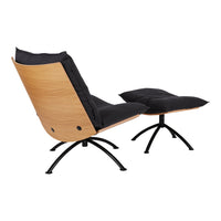Black and wood lounge chair with sleek curves and modern minimalist design, featuring a matching ottoman.