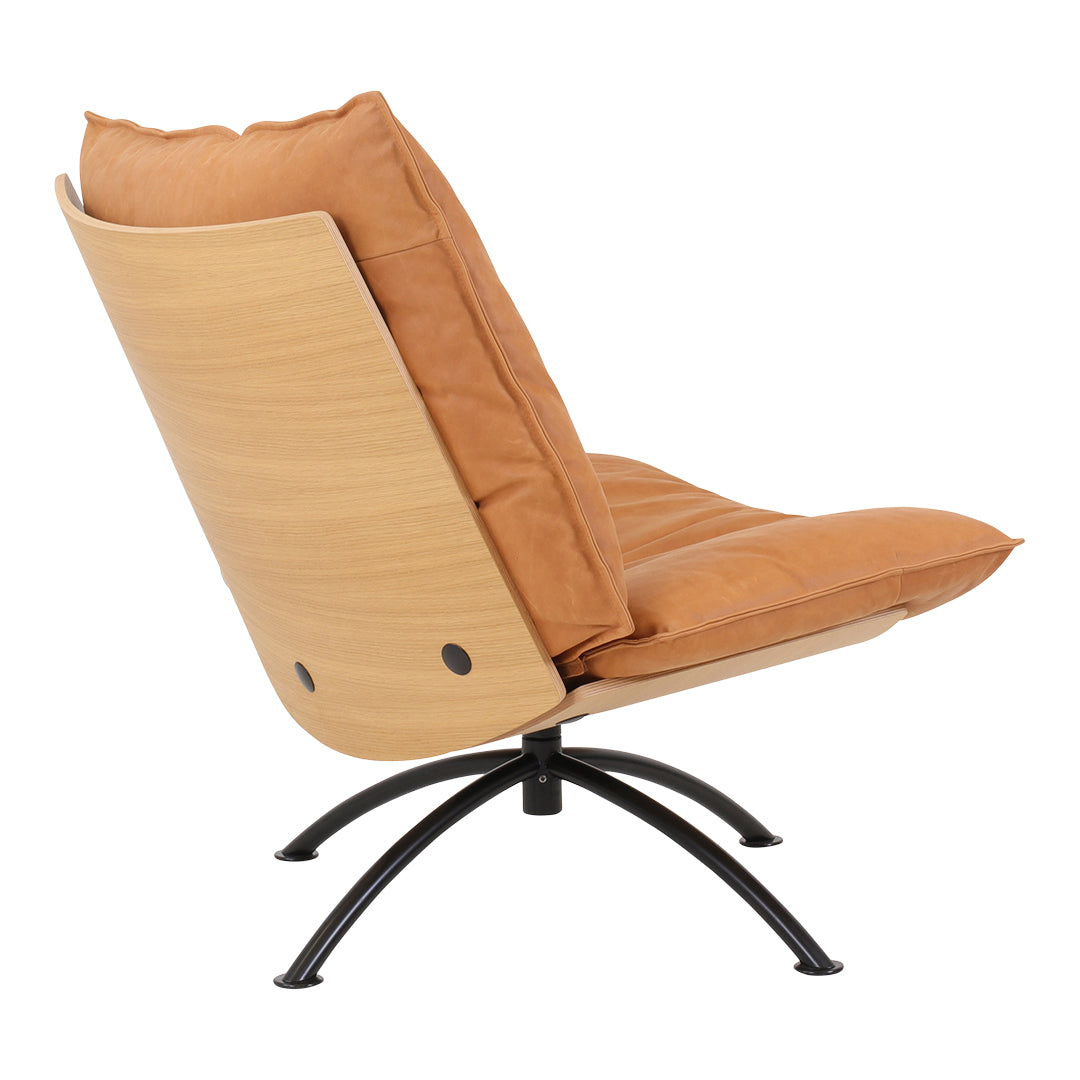 Taupe cushioned chair with a smooth wood backrest and matte black metal base. Modern, minimalist design.