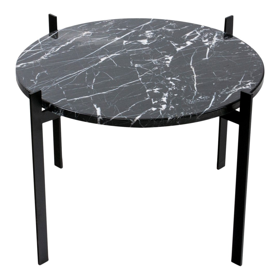 Round black marble side table with white veining and black metal legs, showcasing a modern stylish design.