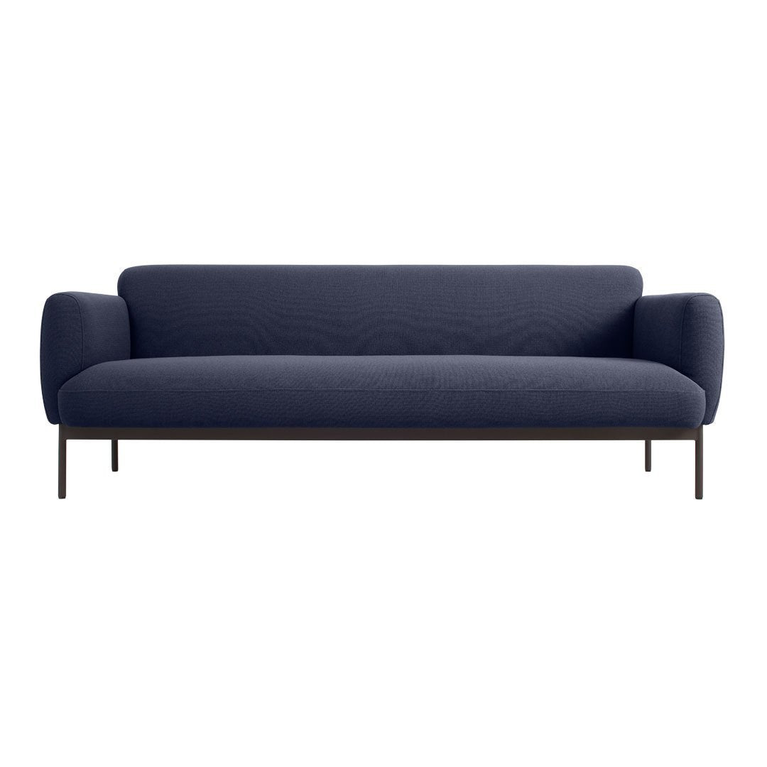 Deep navy blue sofa with a sleek, minimalist design and textured fabric, complemented by dark metal legs.