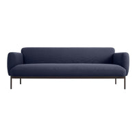 Deep navy blue sofa with a sleek, minimalist design and textured fabric, complemented by dark metal legs.