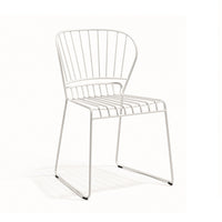 White metal chair with a sleek, minimalist design featuring a striped backrest and smooth legs. Ideal for modern decor.
