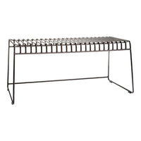 Black metal bench with striped pattern, featuring a sleek, modern design and open slat construction.