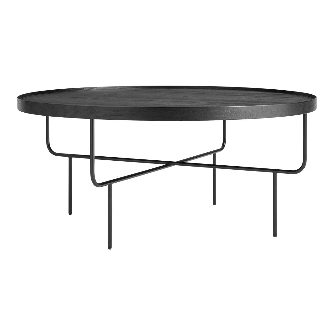 Round black coffee table with a sleek matte surface and minimalist metal legs, perfect for modern decor.