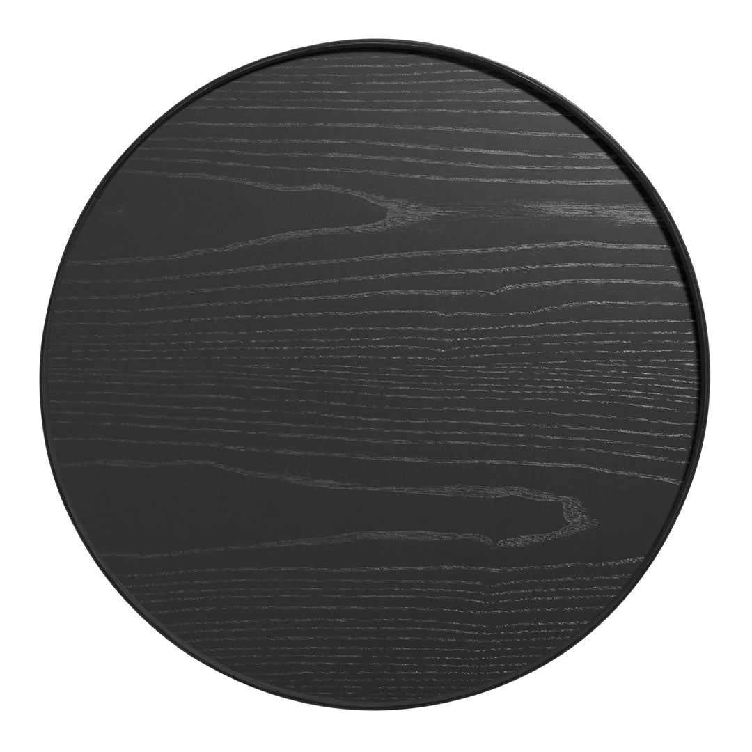 Round black wood table with a sleek, grainy texture, featuring a modern minimalist design. Perfect for contemporary decor.