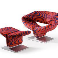 Vibrant orange and navy blue swirling pattern on modern curved chairs, adding a bold touch to any space.