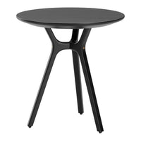 Simple black round table with a smooth finish and sleek, modern legs. Perfect for minimalist decor.