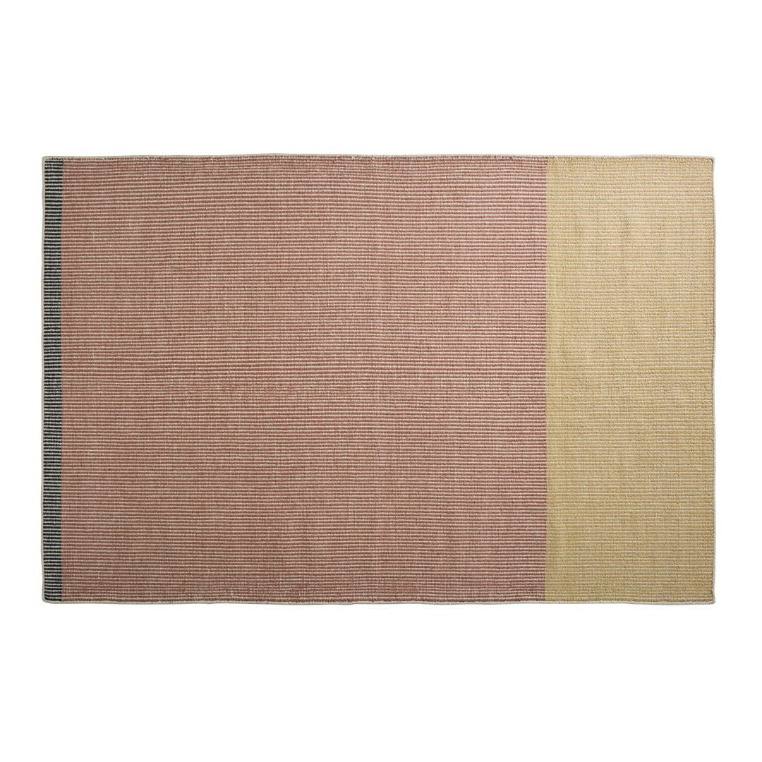 "Textured rectangular rug with soft pink, beige, and gray color blocks, featuring a modern minimalist design."